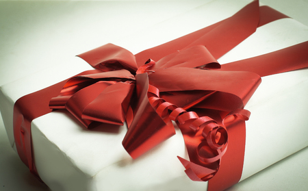 closeup.boxes with gifts with a beautiful red ribbonの写真素材