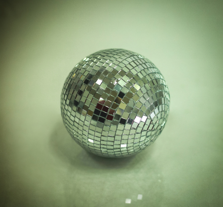 mirror ball.isolated on a dark background.の写真素材