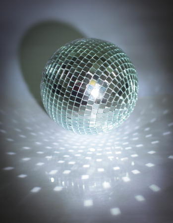 mirror ball.isolated on a dark background.の写真素材