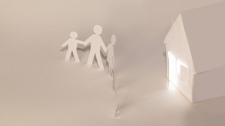 men made of paper and paper houseの写真素材