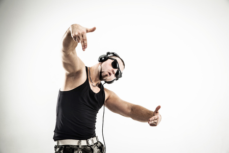 emotional and charismatic DJ - rapper in headphones takes the raの写真素材