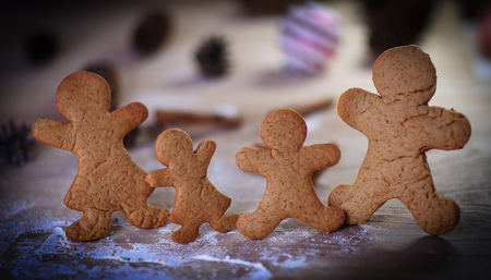 candles and gingerbread men at the Christmas table