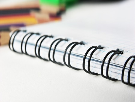 closeup of a blurred image of notebook on a white background.photo with copy space