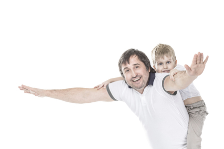 concept of childrens happiness: happy father playing with his five year old sonの写真素材
