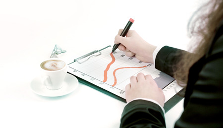 close-up. business woman making a marketing schedule