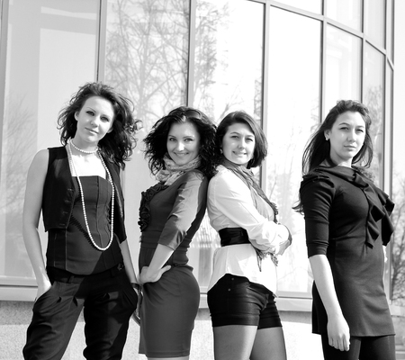 office colleagues standing near the office buildingの写真素材