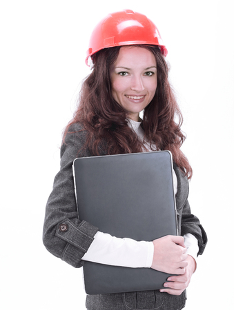 female architect with laptop.isolated on a whiteの写真素材