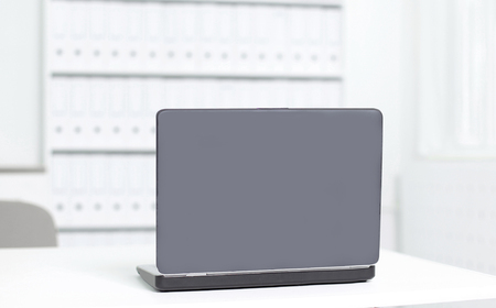 laptop on the Desk in the office.photo with copy spaceの写真素材