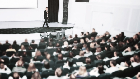 Speaker at a business convention and presentations. The audience on the large number of people