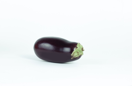 ripe aubergine isolated on a white background .の写真素材