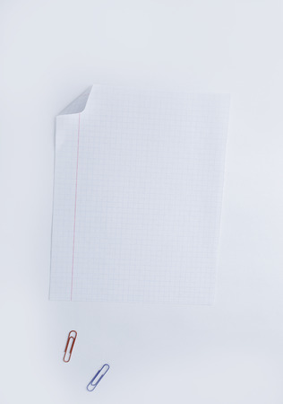 close up.a sheet of notebook and paper clip .photo with copy spaの写真素材