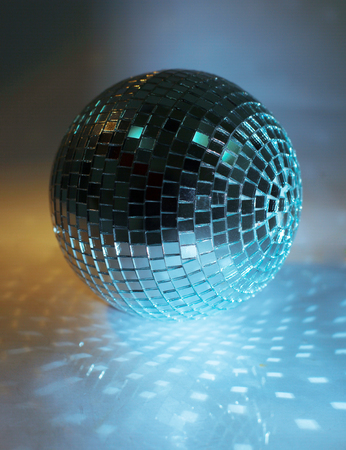 mirror ball.isolated on a dark background.の写真素材