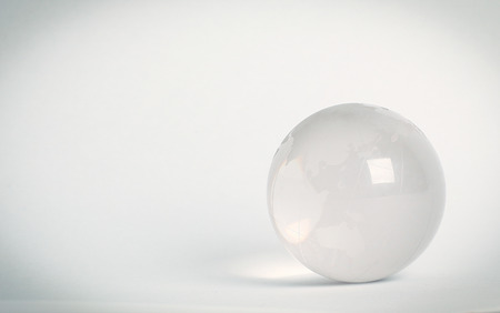 small glass globe.isolated on a white background.の写真素材