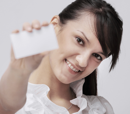 young business woman showing blank business card .の写真素材
