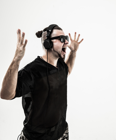 badass rapper headphones performs a rap song