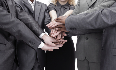 business people showing unity with their hands togetherの写真素材