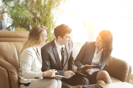 group of business people discussing the document in the Bank hall.の写真素材