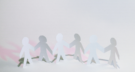 concept of teamwork.team paper men standingの写真素材