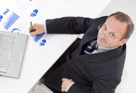 top view. responsible businessman looking at the cameraの写真素材