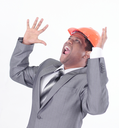 handsome engineer architect shouting.isolated on whiteの写真素材