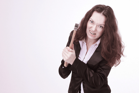 irritated business woman .isolated on a white backgroundの写真素材