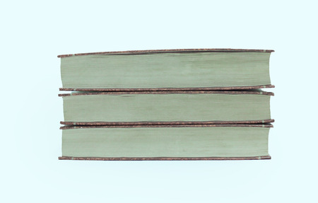 stack of books.isolated on blue background.photo with copy space