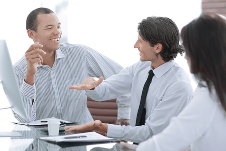 Young businesspeople working on computer in officeの写真素材