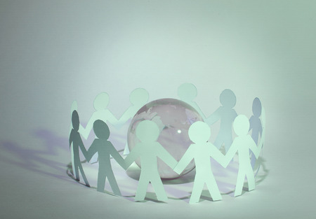 business background.team paper men standing around the glass glの写真素材