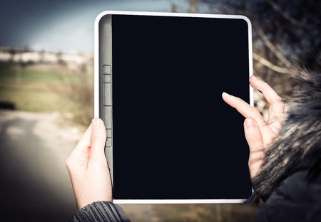 closeup .female hand clicking on a point on the screen of the diの写真素材