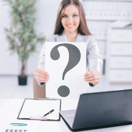 young business woman showing a question mark,の写真素材