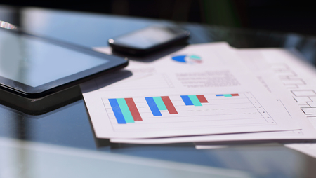close - up of financial schedule on the desktopの写真素材