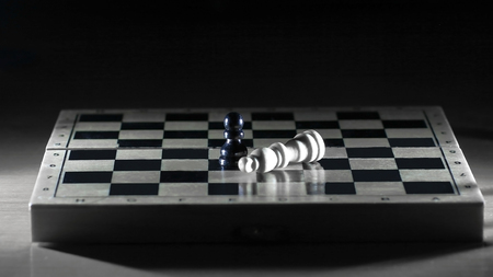 black and white kings on a chess Board . the concept of victoryの写真素材