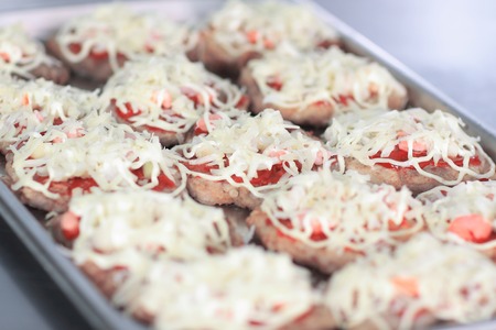 close up.meat baskets on a baking sheetの写真素材