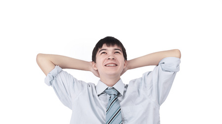 young businessman dreaming and looking at copy spaceの写真素材