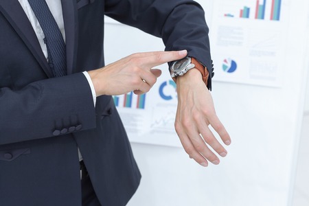 close up.business man looking at his wristwatchの写真素材