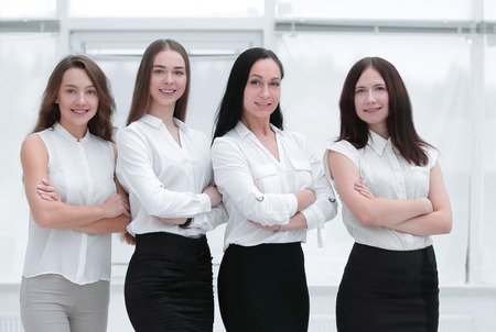 in full growth.portrait of successful business team standing in officeの写真素材