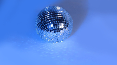 beautiful disco ball on yellow background isolated.の写真素材