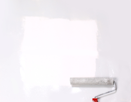 square painted white with the paint roller, on a white sheet ofの写真素材