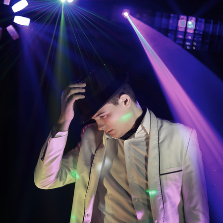 stylish man DJ at a nightclub party .photo with copy spaceの写真素材