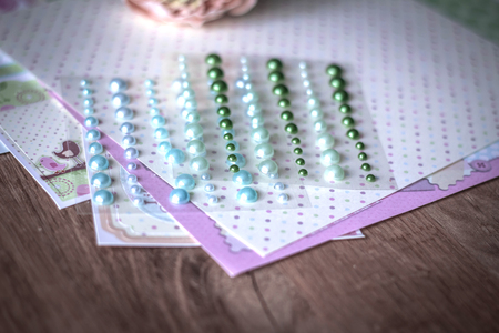 set of shiny beads on a creative backgroundの写真素材