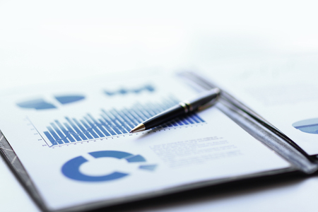 business report with the financial and marketing schedules and handle workplace businessmanの写真素材