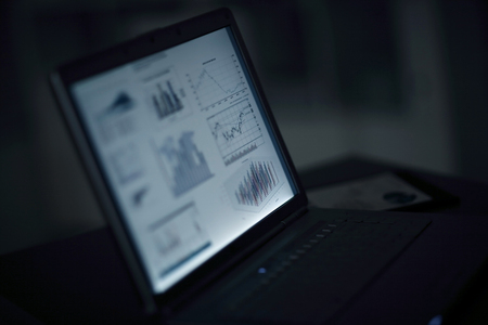 close up.financial chart on the laptop screenの写真素材