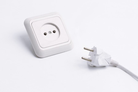 electrical outlet and plug. isolated on a white background