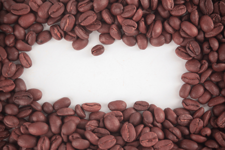 Coffee beans isolated on white background with place for textの写真素材
