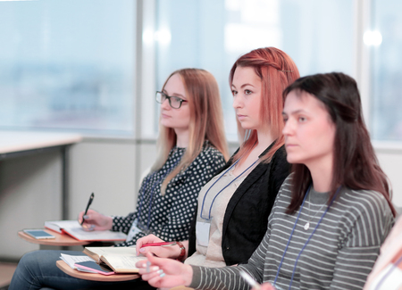 business woman on the background of colleagues in the conference roomの写真素材