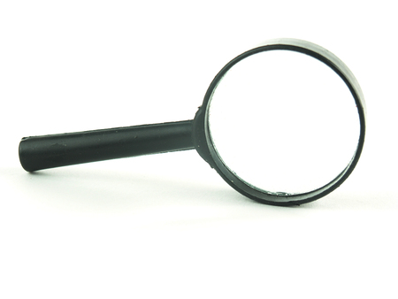 close up. magnifying glass in hand businessman.photo with copy spaceの写真素材