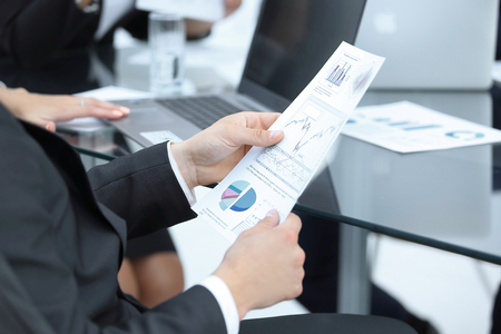 close up. businessman looking at the financial scheduleの写真素材