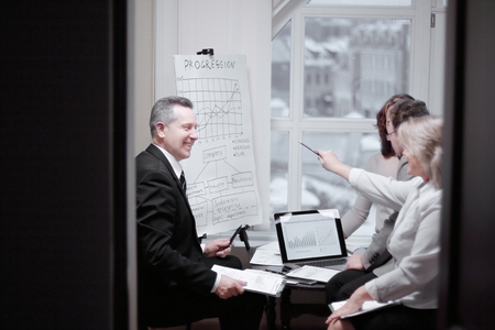 financial partners discussing a new commercial contractの写真素材