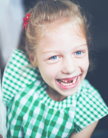 portrait of smiling cute little girl in the nursery.の写真素材