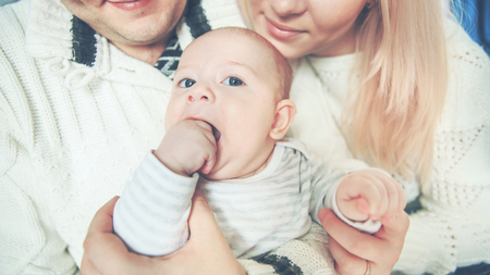portrait of happy family in Christmas with a small childの写真素材
